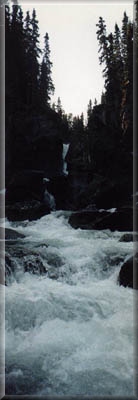 An Alaskan waterfall, poetry in motion.