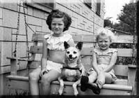 Donna, her little sister and their dog Zipper, still in Kansas.