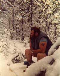 Dick uses the outhouse throne in deep snow.