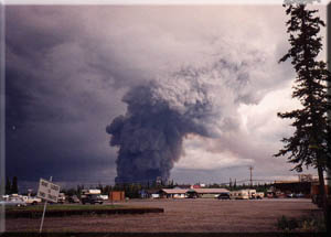 The first plume of the 1990 Tok forest fire, seen from the information center.