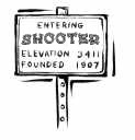 The Shooter, Alaska town sign.