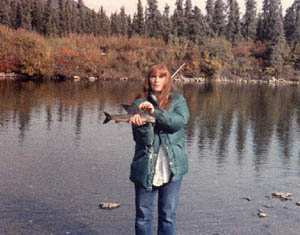 Donna with her catch of the day, an Arctic grayling.